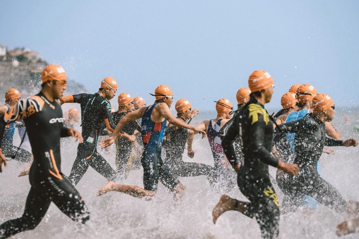 爱游戏入口-关于铁人三项选手携手获金，团队配合完美的信息